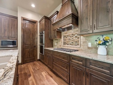 This custom-built, one-level home sits on 2.5 beautifully on Ridges At Sand Creek in Minnesota - for sale on GolfHomes.com, golf home, golf lot