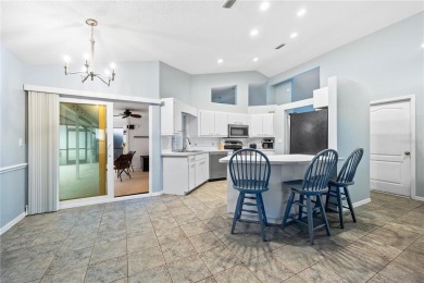 CORNER LOT! Spacious 3 bedroom, 2 bath, 2-car garage pool home on Pinemoor West Golf Club in Florida - for sale on GolfHomes.com, golf home, golf lot