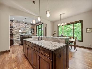 This custom-built, one-level home sits on 2.5 beautifully on Ridges At Sand Creek in Minnesota - for sale on GolfHomes.com, golf home, golf lot