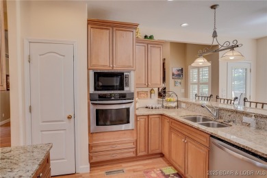 Live the resort life on the 18th hole of the Cove Golf Course on Seasons Ridge At Four Seasons in Missouri - for sale on GolfHomes.com, golf home, golf lot