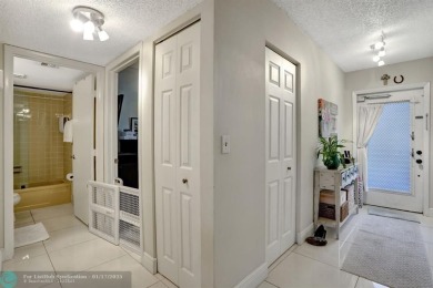 COME SEE THIS BEAUTIFUL GROUND FLOOR 2 BEDROOM 2 BATH HOME IN on  in Florida - for sale on GolfHomes.com, golf home, golf lot