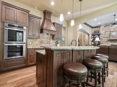 This custom-built, one-level home sits on 2.5 beautifully on Ridges At Sand Creek in Minnesota - for sale on GolfHomes.com, golf home, golf lot