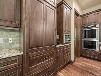 This custom-built, one-level home sits on 2.5 beautifully on Ridges At Sand Creek in Minnesota - for sale on GolfHomes.com, golf home, golf lot