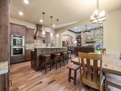 This custom-built, one-level home sits on 2.5 beautifully on Ridges At Sand Creek in Minnesota - for sale on GolfHomes.com, golf home, golf lot