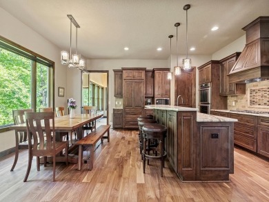 This custom-built, one-level home sits on 2.5 beautifully on Ridges At Sand Creek in Minnesota - for sale on GolfHomes.com, golf home, golf lot