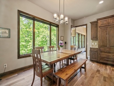 This custom-built, one-level home sits on 2.5 beautifully on Ridges At Sand Creek in Minnesota - for sale on GolfHomes.com, golf home, golf lot