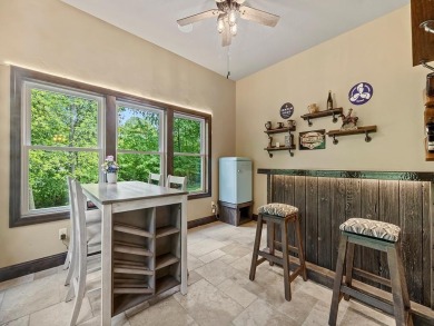 This custom-built, one-level home sits on 2.5 beautifully on Ridges At Sand Creek in Minnesota - for sale on GolfHomes.com, golf home, golf lot