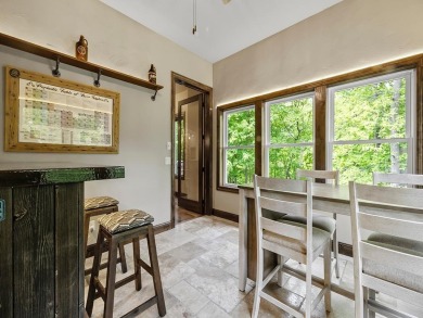 This custom-built, one-level home sits on 2.5 beautifully on Ridges At Sand Creek in Minnesota - for sale on GolfHomes.com, golf home, golf lot