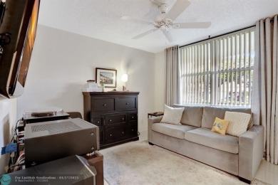 COME SEE THIS BEAUTIFUL GROUND FLOOR 2 BEDROOM 2 BATH HOME IN on  in Florida - for sale on GolfHomes.com, golf home, golf lot