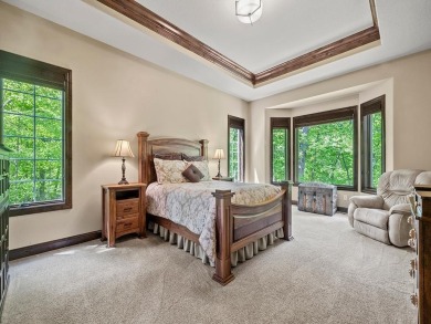This custom-built, one-level home sits on 2.5 beautifully on Ridges At Sand Creek in Minnesota - for sale on GolfHomes.com, golf home, golf lot