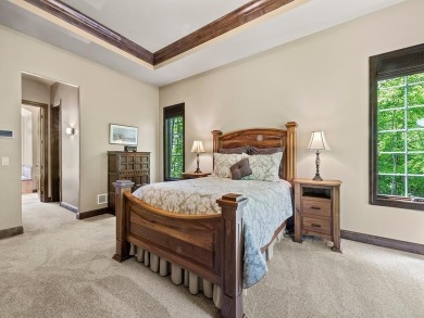 This custom-built, one-level home sits on 2.5 beautifully on Ridges At Sand Creek in Minnesota - for sale on GolfHomes.com, golf home, golf lot