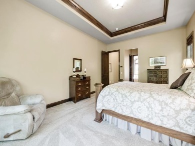This custom-built, one-level home sits on 2.5 beautifully on Ridges At Sand Creek in Minnesota - for sale on GolfHomes.com, golf home, golf lot
