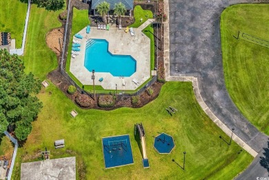 Discover your coastal haven in the tranquil Kings Grant on Indigo Creek Golf Club in South Carolina - for sale on GolfHomes.com, golf home, golf lot