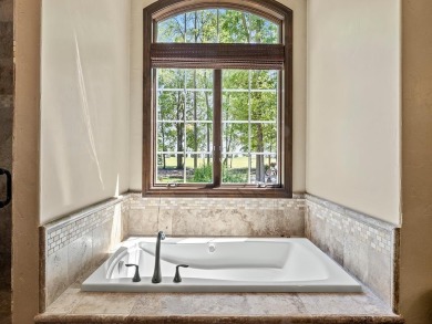 This custom-built, one-level home sits on 2.5 beautifully on Ridges At Sand Creek in Minnesota - for sale on GolfHomes.com, golf home, golf lot