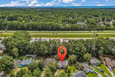 Discover your coastal haven in the tranquil Kings Grant on Indigo Creek Golf Club in South Carolina - for sale on GolfHomes.com, golf home, golf lot
