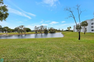 COME SEE THIS BEAUTIFUL GROUND FLOOR 2 BEDROOM 2 BATH HOME IN on  in Florida - for sale on GolfHomes.com, golf home, golf lot