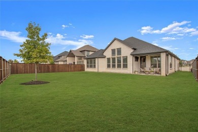 Step into luxury in this breathtaking single-story north facing on PGA Americas Golf Course in Texas - for sale on GolfHomes.com, golf home, golf lot