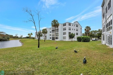 COME SEE THIS BEAUTIFUL GROUND FLOOR 2 BEDROOM 2 BATH HOME IN on  in Florida - for sale on GolfHomes.com, golf home, golf lot