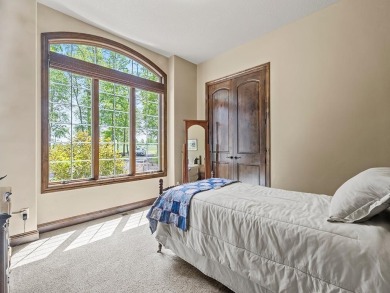 This custom-built, one-level home sits on 2.5 beautifully on Ridges At Sand Creek in Minnesota - for sale on GolfHomes.com, golf home, golf lot