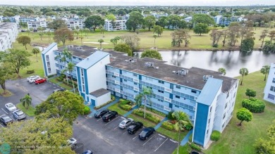 COME SEE THIS BEAUTIFUL GROUND FLOOR 2 BEDROOM 2 BATH HOME IN on  in Florida - for sale on GolfHomes.com, golf home, golf lot