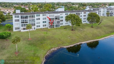 COME SEE THIS BEAUTIFUL GROUND FLOOR 2 BEDROOM 2 BATH HOME IN on  in Florida - for sale on GolfHomes.com, golf home, golf lot