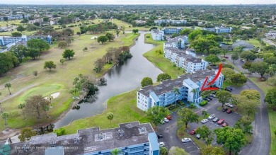 COME SEE THIS BEAUTIFUL GROUND FLOOR 2 BEDROOM 2 BATH HOME IN on  in Florida - for sale on GolfHomes.com, golf home, golf lot