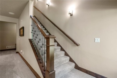 This custom-built, one-level home sits on 2.5 beautifully on Ridges At Sand Creek in Minnesota - for sale on GolfHomes.com, golf home, golf lot
