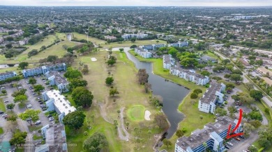 COME SEE THIS BEAUTIFUL GROUND FLOOR 2 BEDROOM 2 BATH HOME IN on  in Florida - for sale on GolfHomes.com, golf home, golf lot