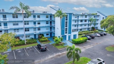 COME SEE THIS BEAUTIFUL GROUND FLOOR 2 BEDROOM 2 BATH HOME IN on  in Florida - for sale on GolfHomes.com, golf home, golf lot