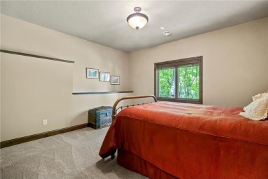 This custom-built, one-level home sits on 2.5 beautifully on Ridges At Sand Creek in Minnesota - for sale on GolfHomes.com, golf home, golf lot