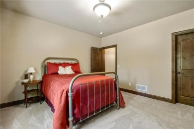 This custom-built, one-level home sits on 2.5 beautifully on Ridges At Sand Creek in Minnesota - for sale on GolfHomes.com, golf home, golf lot