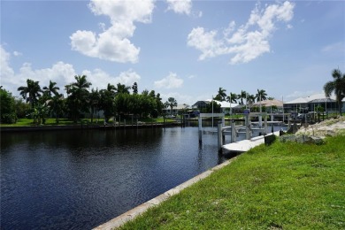 PRIME LOT! Discover the epitome of waterfront living in the on Saint Andrews South Golf Club in Florida - for sale on GolfHomes.com, golf home, golf lot