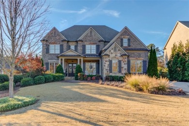 Experience timeless elegance in this stunning brick and stone on TPC At Sugarloaf Golf Club in Georgia - for sale on GolfHomes.com, golf home, golf lot