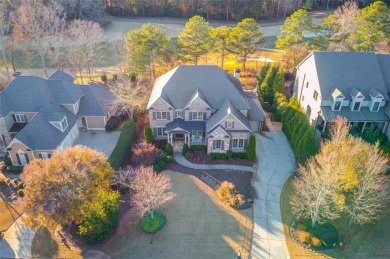 Experience timeless elegance in this stunning brick and stone on TPC At Sugarloaf Golf Club in Georgia - for sale on GolfHomes.com, golf home, golf lot