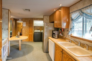 Welcome to this beautifully maintained 2-bedroom, 2-bath home in on Bison Golf and Country Club in Arizona - for sale on GolfHomes.com, golf home, golf lot