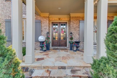 Experience timeless elegance in this stunning brick and stone on TPC At Sugarloaf Golf Club in Georgia - for sale on GolfHomes.com, golf home, golf lot