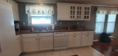Located in beautiful Rolling Greens Village, this spacious 2 on Rolling Greens Executive Golf Community in Florida - for sale on GolfHomes.com, golf home, golf lot