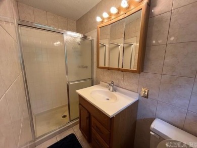 This 3 Bedroom 2 Bath home located in the Lakeside School on Hot Springs Golf and Country Club in Arkansas - for sale on GolfHomes.com, golf home, golf lot