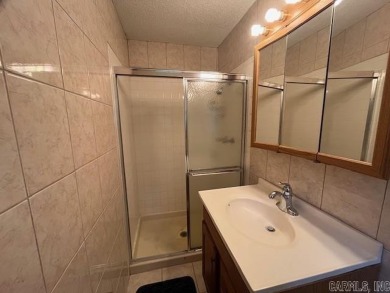 This 3 Bedroom 2 Bath home located in the Lakeside School on Hot Springs Golf and Country Club in Arkansas - for sale on GolfHomes.com, golf home, golf lot