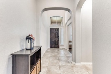 Welcome to this well-maintained 4-bedroom, 3.5-bath two-story on The Golf Club At Champions Circle in Texas - for sale on GolfHomes.com, golf home, golf lot