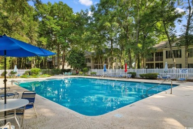 Nestled within the prestigious Weehawka Woods of Pawleys on Pawleys Plantation Golf and Country Club in South Carolina - for sale on GolfHomes.com, golf home, golf lot