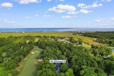 Nestled within the prestigious Weehawka Woods of Pawleys on Pawleys Plantation Golf and Country Club in South Carolina - for sale on GolfHomes.com, golf home, golf lot