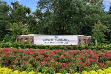 Nestled within the prestigious Weehawka Woods of Pawleys on Pawleys Plantation Golf and Country Club in South Carolina - for sale on GolfHomes.com, golf home, golf lot