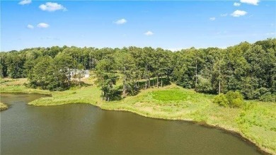 Private beautiful lake front lot curated from a formerly on Trophy Club of Atlanta in Georgia - for sale on GolfHomes.com, golf home, golf lot