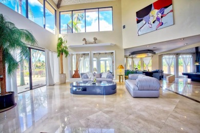 Experience unparalleled elegance in the heart of Boca Grove! on Boca Grove Golf and Tennis in Florida - for sale on GolfHomes.com, golf home, golf lot