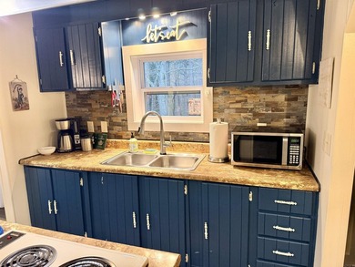 Adorable furnished getaway near the Middle Fork River of Greers on  in Arkansas - for sale on GolfHomes.com, golf home, golf lot