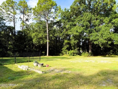 This 2 story, 4-bedroom, 2-bath home is nestled in an area near on Starke Golf and Country Club in Florida - for sale on GolfHomes.com, golf home, golf lot