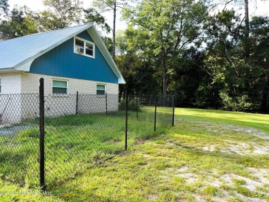 This 2 story, 4-bedroom, 2-bath home is nestled in an area near on Starke Golf and Country Club in Florida - for sale on GolfHomes.com, golf home, golf lot
