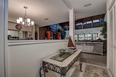 A true gem nestled in the GATED COMMUNITY of East Lake Woodlands on Emerald Greens Golf Resort and Country Club in Florida - for sale on GolfHomes.com, golf home, golf lot