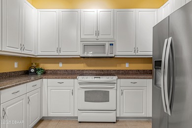 Welcome home to this 2 bedroom, 3 full bath townhome in on Plantation Bay Golf and Country Club in Florida - for sale on GolfHomes.com, golf home, golf lot